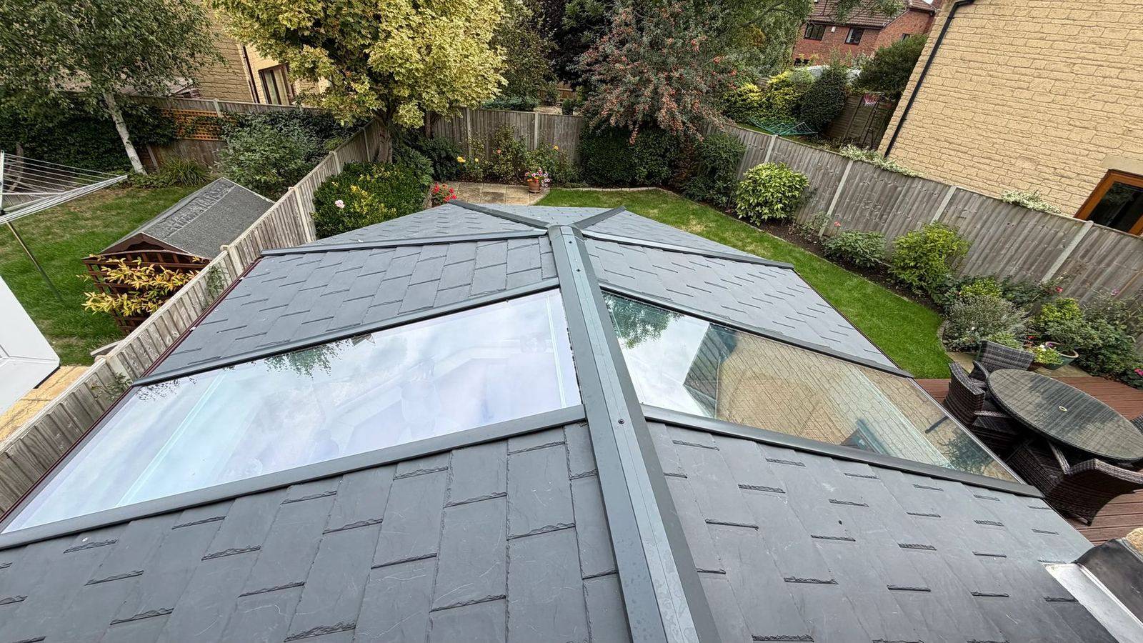 Ultraroof from above showing two full-length glazed panels in a grey tiled roof